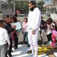 Nipsey Hussle greets kids at the Nipsey Hussle x PUMA Hoops Basketball Court Refurbishment Reveal Event on October 22, 2018 in Los Angeles, California.